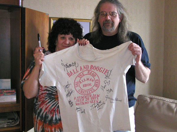 Frank and Donna Lagana, holding an original Watkins Glen t-shirt, signed by the entire present band.  The Beacon Hotel, March, 2002.