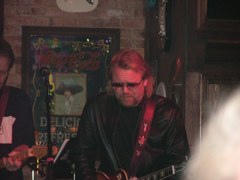 5th Annual Jam For Duane - 10/29/05 - 2nd Street Music Hall - Gadsden, AL - Capricorn Rhythm Section - Lee Roy Parnell, and perhaps we get a glimpse of Duane Allman's spirit on the right. No blondes sitting at our table, so who knows?