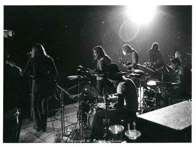 Shot from backstage at the Macon Coliseum 9 April 1971, into the spotlight creating the reflection off the rear lens element.  It was awesome being there.