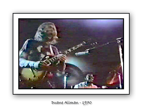 I captured this off an MPEG clip of the ABB playing in 1970. The quality is dreadful but, I cleaned it up in Photoshop all the same. Duane is playing his Tobacco Burst LP here but, Dickie is playing a Cherry Red Gibson SG. I'll submit a series of these in the near future. Like I said, the quality is rather poor but, there are sooooo few pics of Duane you know. 
Enjoy!
Greg